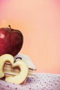 An apples and books on the fabric