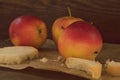 Apples on brown paper on wood. Vintage look