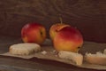 Apples on brown paper on wood. Vintage look