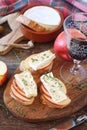 Apples and Camembert cheese bread toast and glass of red wine Royalty Free Stock Photo