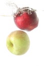 Apples fruit in splash Royalty Free Stock Photo