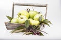 green apples in wooden square basket