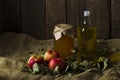 Apples with a jar of honey and a bottle of olive oil Royalty Free Stock Photo