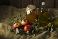 Apples with a jar of honey and a bottle of olive oil Royalty Free Stock Photo