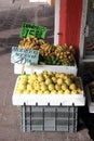 Apples [Manzana] & Bananas [Dominico] in crates outside shop Royalty Free Stock Photo