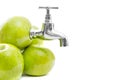 Apples with metal tap on white background.