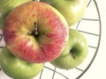 Apples on a metallic basket Royalty Free Stock Photo