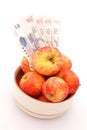 Apples with money Royalty Free Stock Photo