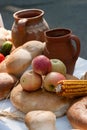 Apples, fresh made bread and corn