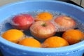 Apples and Oranges in Water Royalty Free Stock Photo