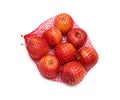 Apples packaged in the red net Royalty Free Stock Photo
