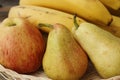 Apples pears and bananas on the table