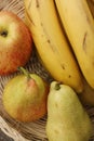 Apples pears and bananas on the table