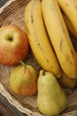 Apples pears and bananas on the table