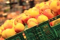 Apples in plastic boxes in a store, close-up Royalty Free Stock Photo