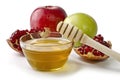 Apples, pomegranate and bowl of honey Royalty Free Stock Photo