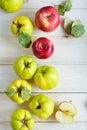 Apples and quinces on plank