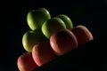 Apples red and green with low key lighting. Royalty Free Stock Photo