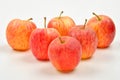Apples, red and yellow on a bright background Royalty Free Stock Photo