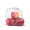 Apples in reusable eco friendly bag on white isolated background Royalty Free Stock Photo