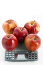 Apples on scale Royalty Free Stock Photo