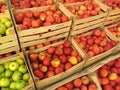 Apples in selling crates on market Royalty Free Stock Photo