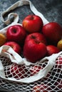 Apples starking in the mesh bag