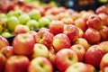 Apples on supermarket apple shelves display retail store organic local farmers food fruits healthy eating fresh supply