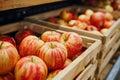 Apples on supermarket apple shelves display retail store organic local farmers food fruits healthy eating fresh supply