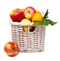 Apples and tangerines in a basket