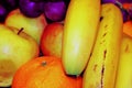 Apples, tangerines, grapes and banana. Background of different fruits