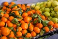 Apples and tangerines in greengrocery Royalty Free Stock Photo