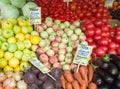 Apples, tomatoes, carrots, beets at Vegetable Fair counter