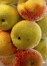 Apples in a vase of soda water Royalty Free Stock Photo