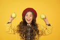 Apples vitamin snack. Girl cute long curly hair hold apples. Child girl emotional smiling face expression. Delicious and