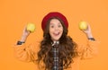 Apples vitamin snack. Girl cute long curly hair hold apples. Child girl emotional smiling face expression. Delicious and