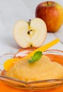 Applesauce with cinnamon and orange spoon