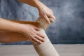 Application of elastic compression bandage Royalty Free Stock Photo