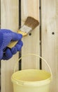 Application of liquid antiseptic on a wooden grid