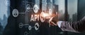 Application Programming Interface. API software development tool. Information technology concept. Businessman presses Royalty Free Stock Photo