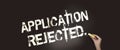 Application rejected written with chalk on blackboard. Concept of denied education application, rejection to injury