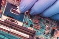 Application of thermal paste on the laptop processor chip for high-quality cooling Royalty Free Stock Photo