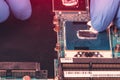 Application of thermal paste on the laptop processor chip for high-quality cooling Royalty Free Stock Photo