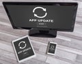 Application update concept on different devices Royalty Free Stock Photo