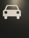Applique white car on a black wall. Royalty Free Stock Photo