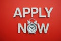 Apply Now alphabet letters on red background Royalty Free Stock Photo