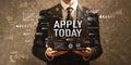 Apply today with businessman holding a tablet computer