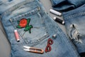 Applying embroidered patches to jeans