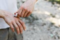 Applying an emollient to dry flaky skin as in the treatment of psoriasis, eczema and other dry skin conditions. White Royalty Free Stock Photo