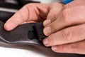 Applying glue on inner tube of a bicycle Royalty Free Stock Photo